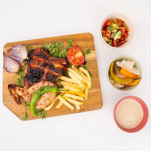 دجاجة كاملة على الفحم